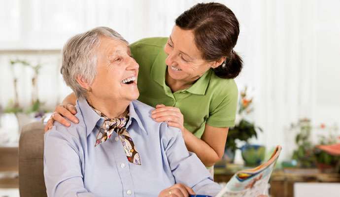 Retirement home concept with nurse woman