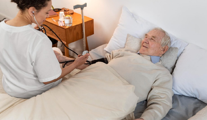 Doctor Checking Blood Pressure Male Patient